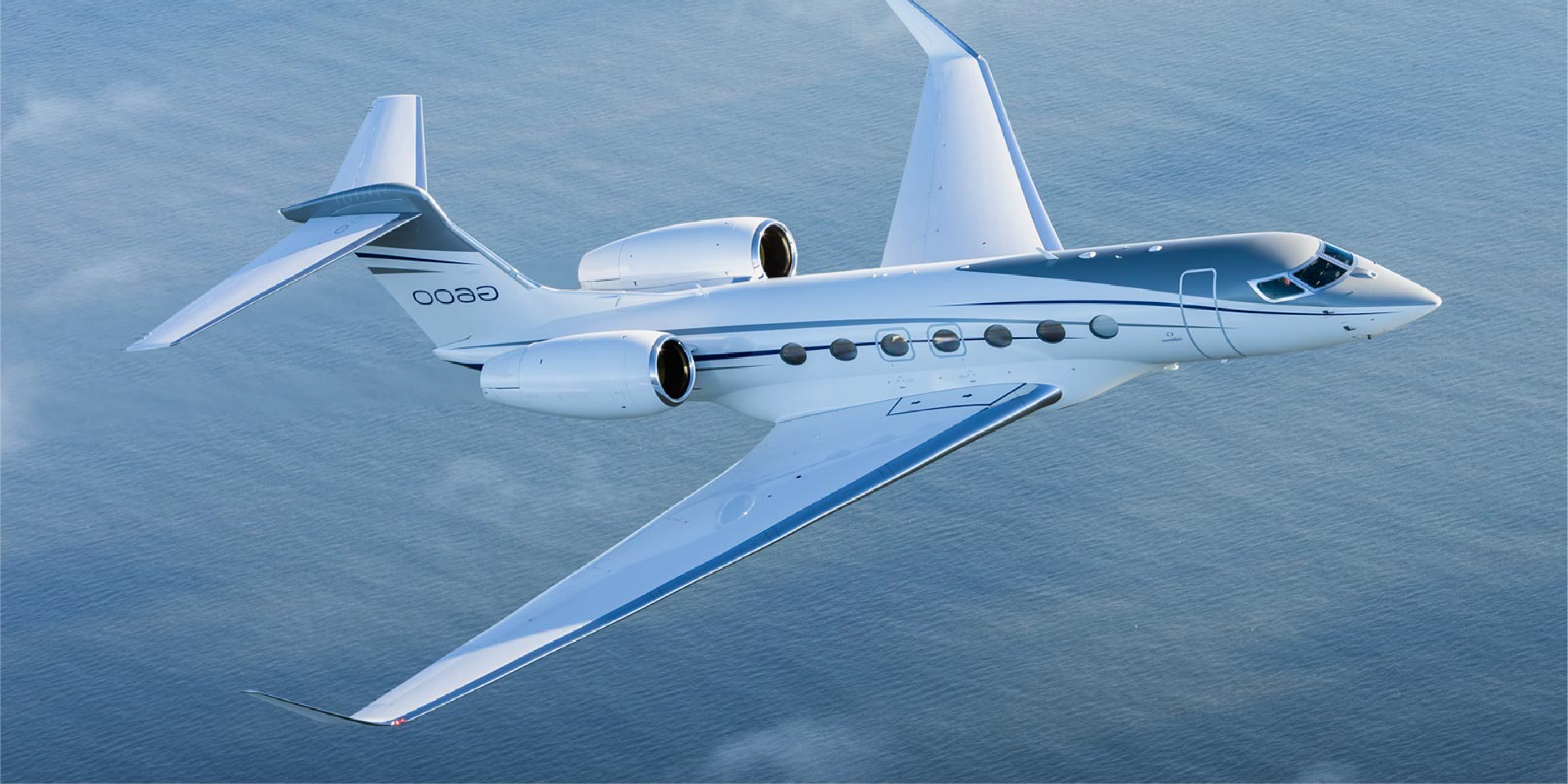 Private jet over the sea